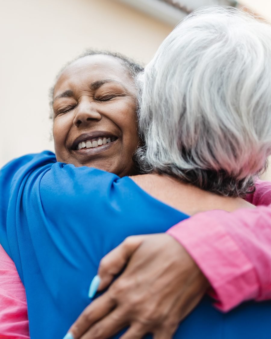 Two women embracing