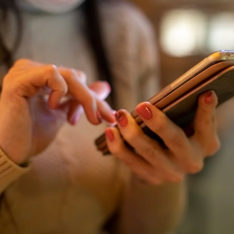 A woman using a phone