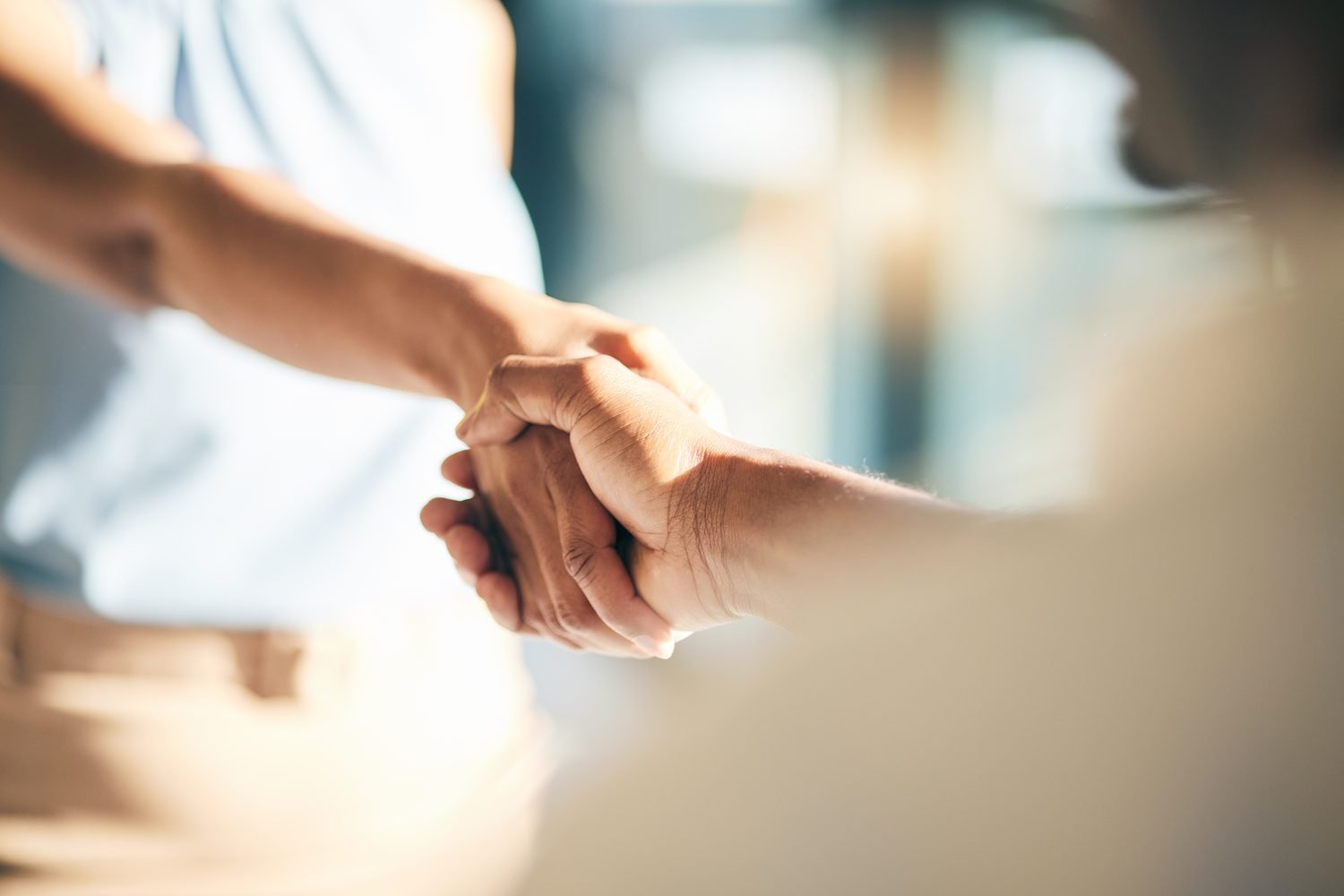Two people shaking hands